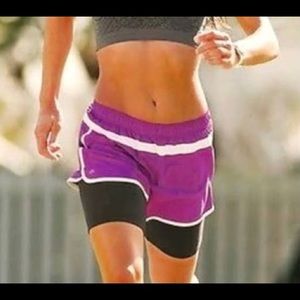 Athleta  "hana" 2 in 1 purple running shorts